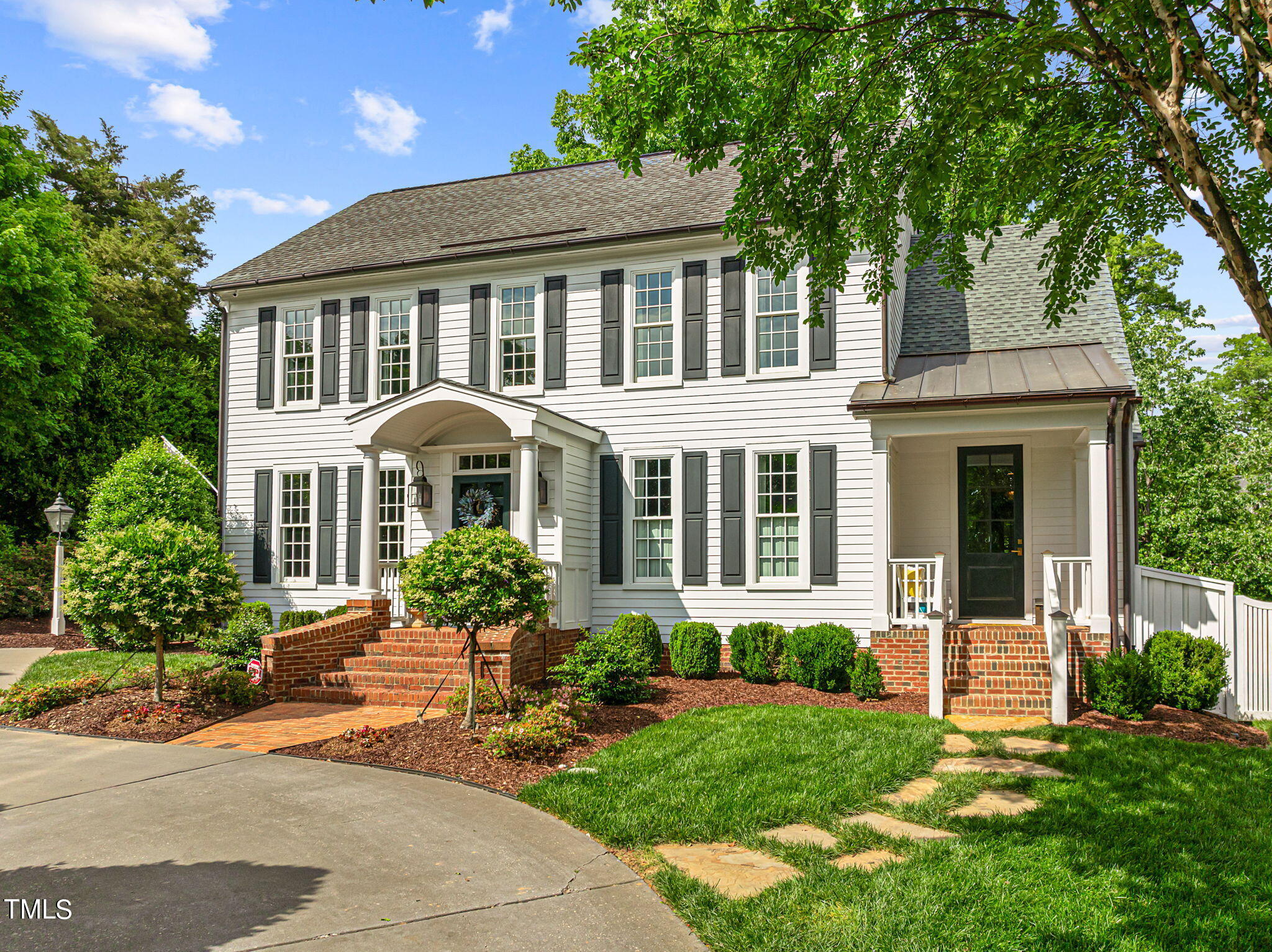 2335 Hales Road Raleigh, NC 27608 - Photo 65 of 65 front view of a house with a yard