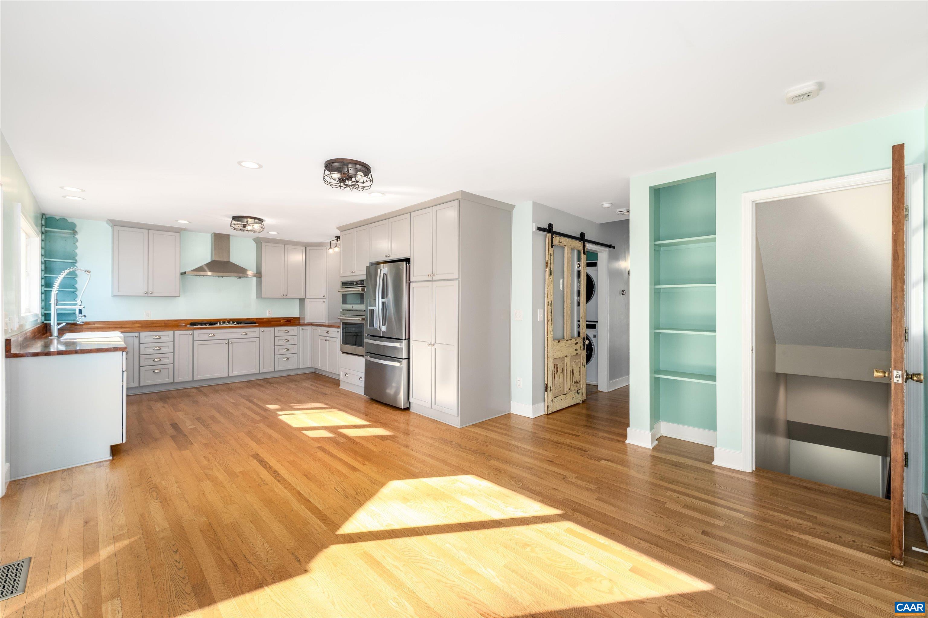 9 Vine Ridge Drive Palmyra, VA 22963 - Photo 28 of 72 a large kitchen with a refrigerator and a sink