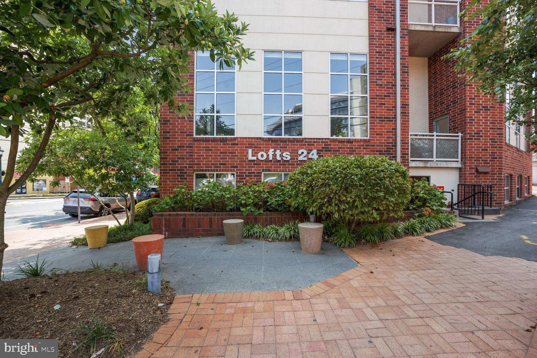 900 Bonifant Street, Unit D Silver Spring, MD 20910 - Photo 2 of 54 a view of a building with garden and sitting area