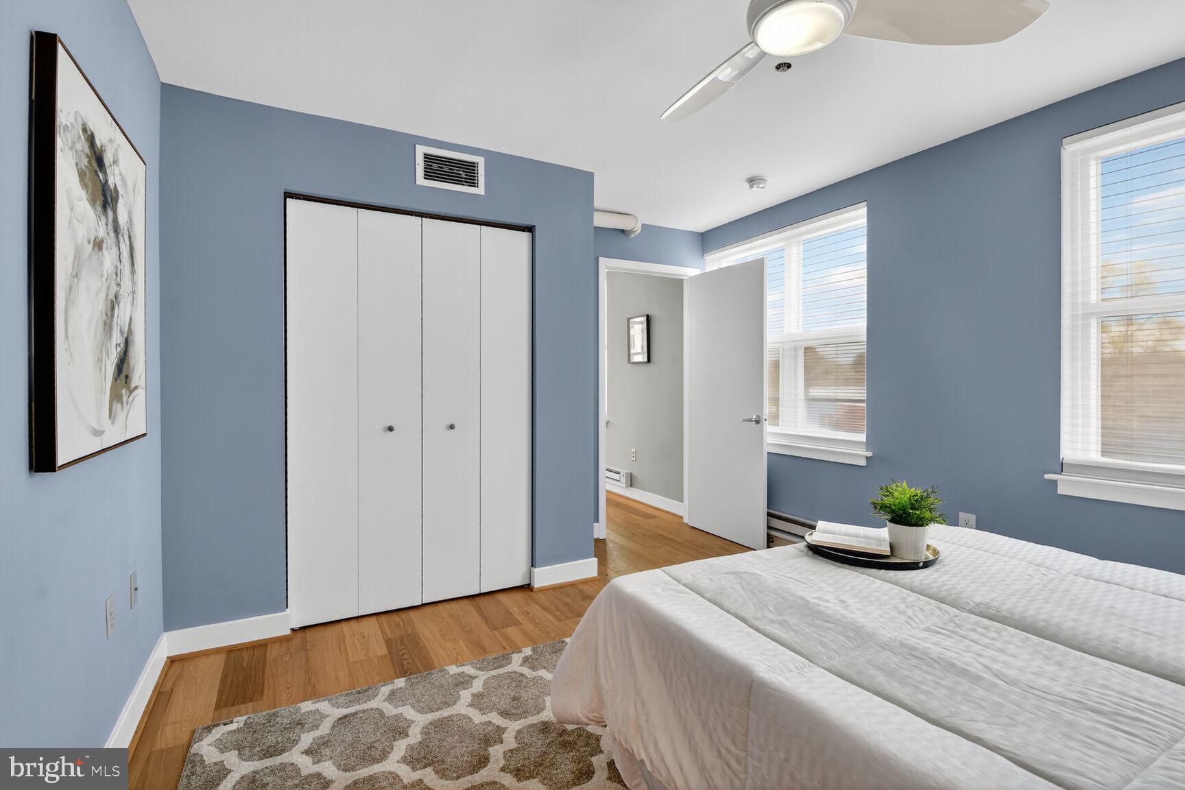 900 Bonifant Street, Unit D Silver Spring, MD 20910 - Photo 22 of 54 a bedroom with a bed and wooden floor