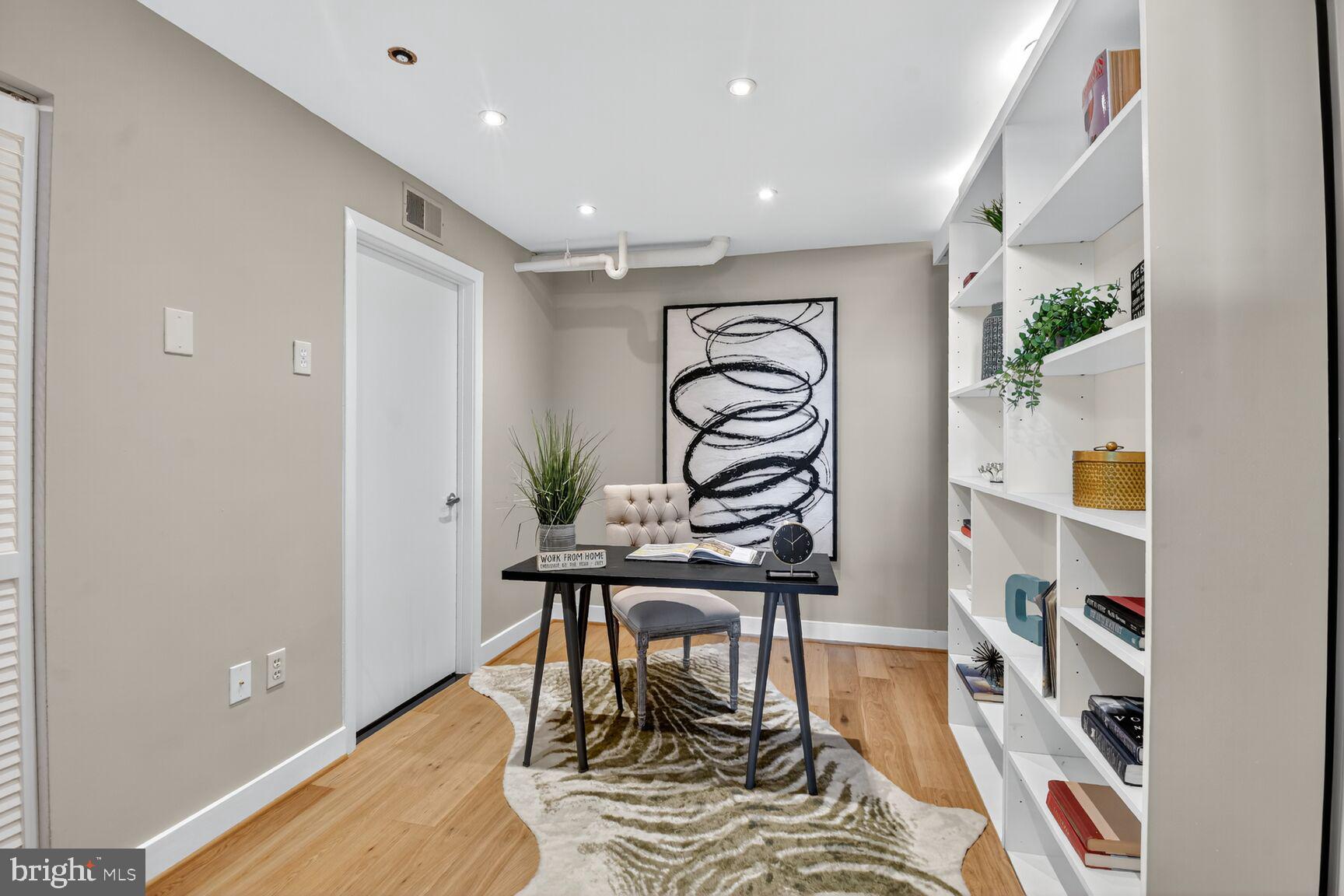 900 Bonifant Street, Unit D Silver Spring, MD 20910 - Photo 24 of 54 a workspace with furniture and wooden floor