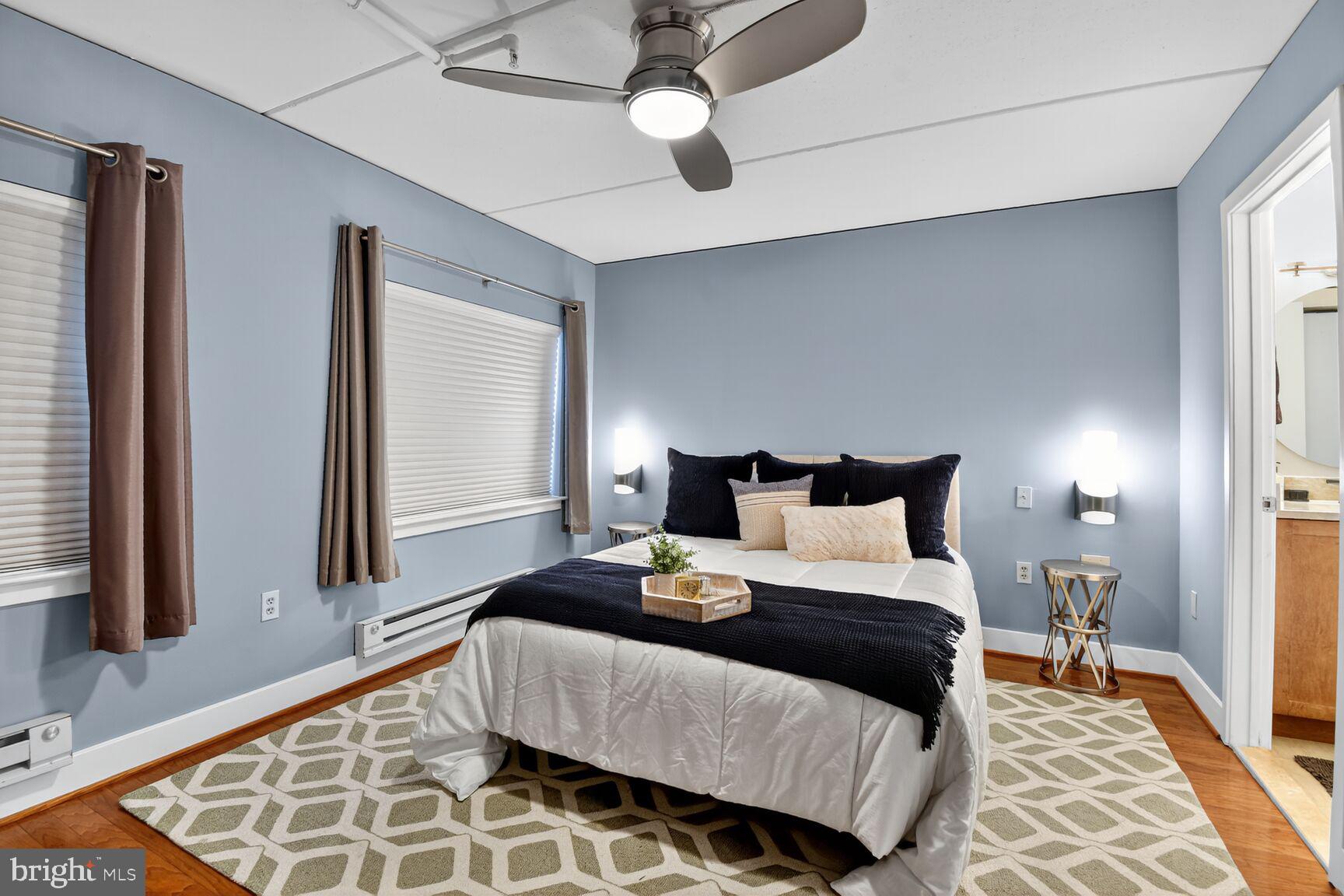 900 Bonifant Street, Unit D Silver Spring, MD 20910 - Photo 35 of 54 a bedroom with a large bed and a window