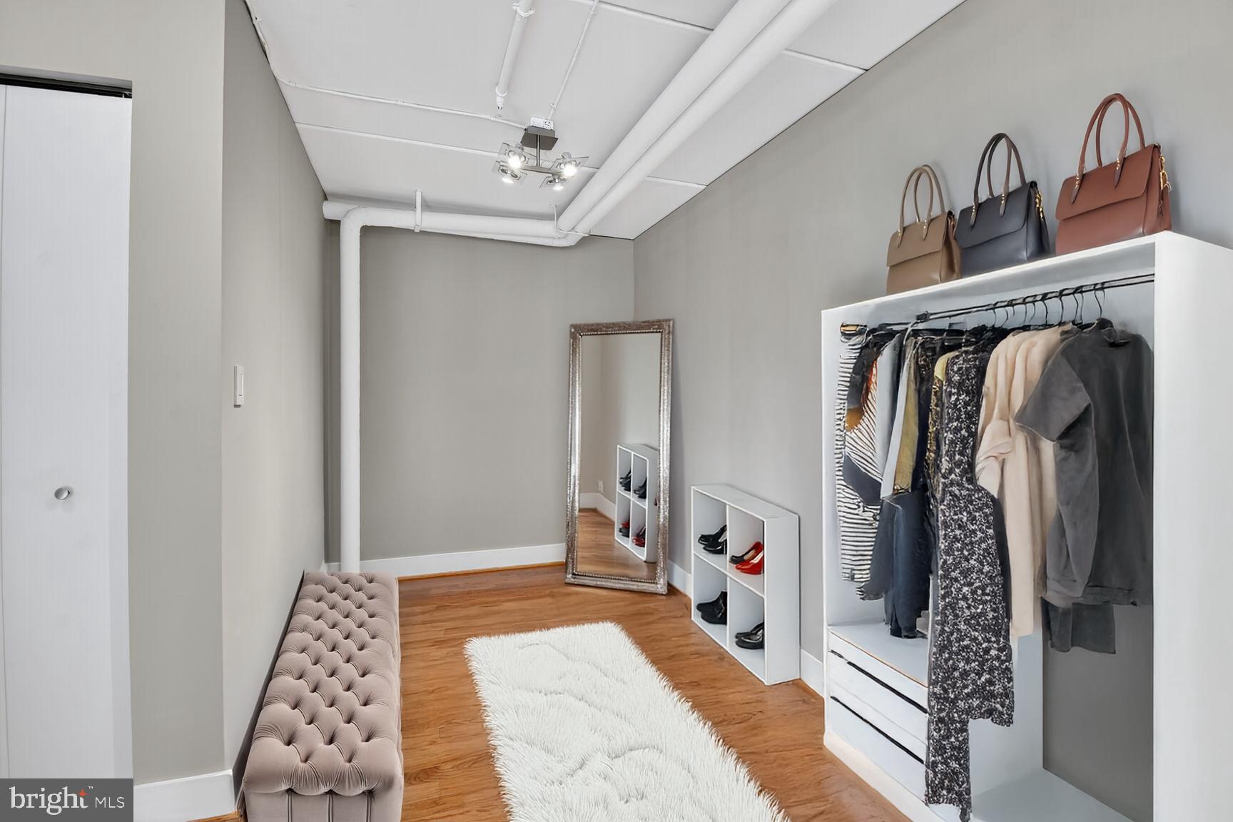 900 Bonifant Street, Unit D Silver Spring, MD 20910 - Photo 42 of 54 a bedroom with bed and gym equipment