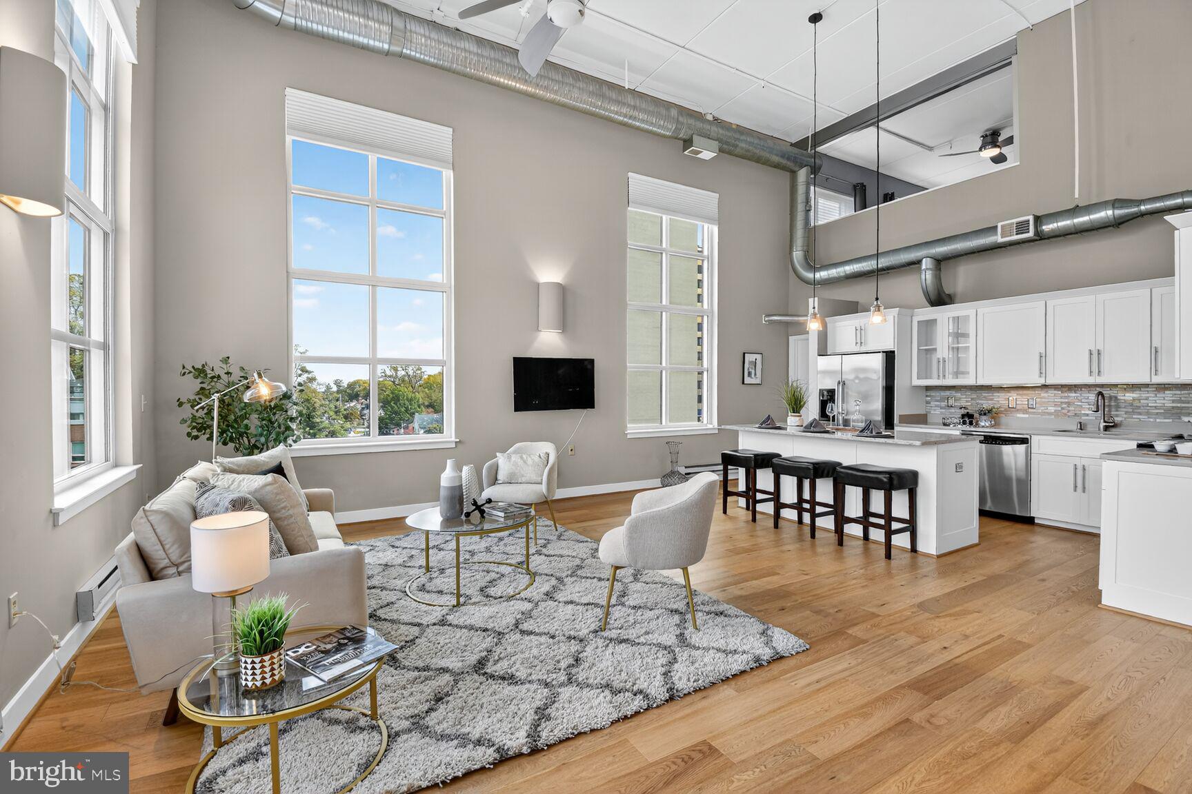 900 Bonifant Street, Unit D Silver Spring, MD 20910 - Photo 8 of 54 a view of a dining room with furniture window and wooden floor