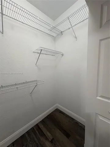 a view of a room with racks on the wall