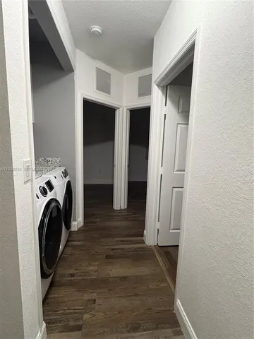 a view of a storage & utility room with washer and dryer