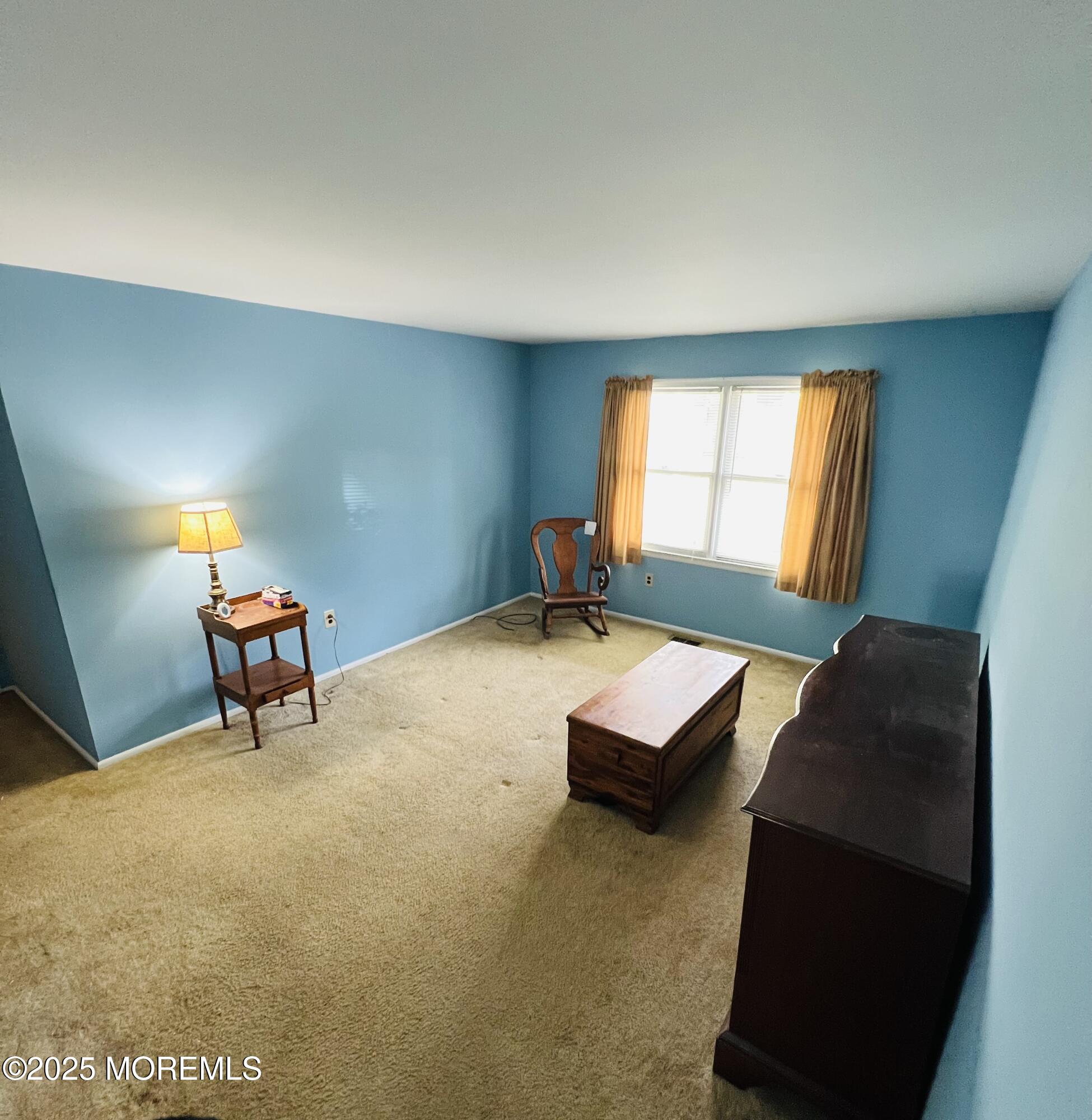 29 Mulberry Court, Unit D Brielle, NJ 08730 - Photo 11 of 22 a living room with furniture and a window