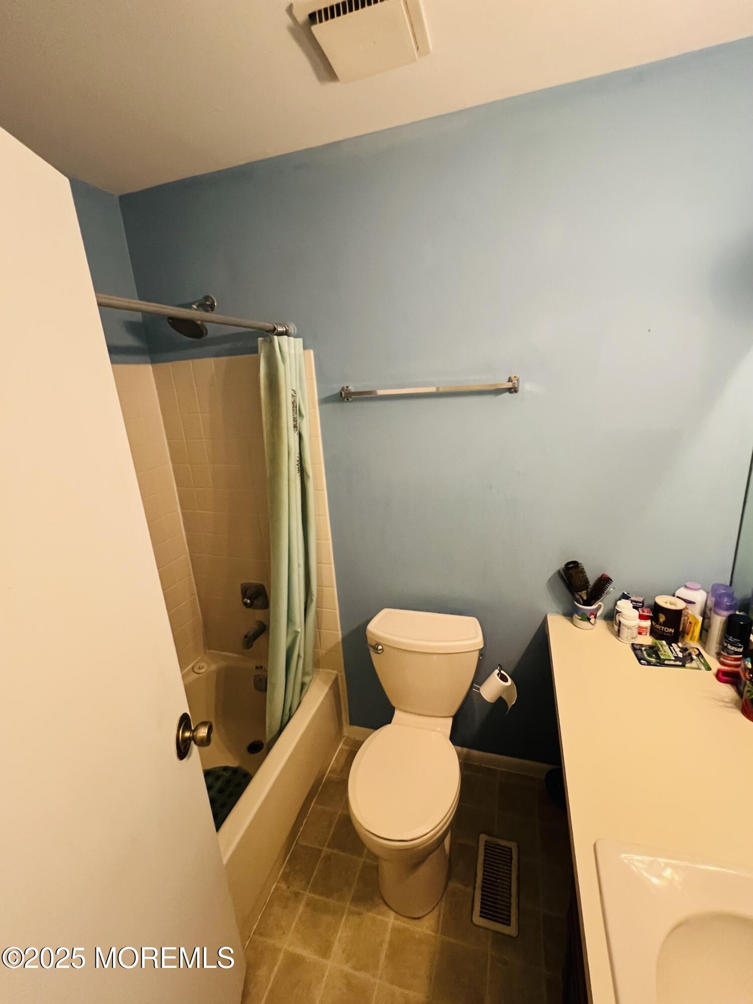 29 Mulberry Court, Unit D Brielle, NJ 08730 - Photo 12 of 22 a bathroom with a toilet and a shower