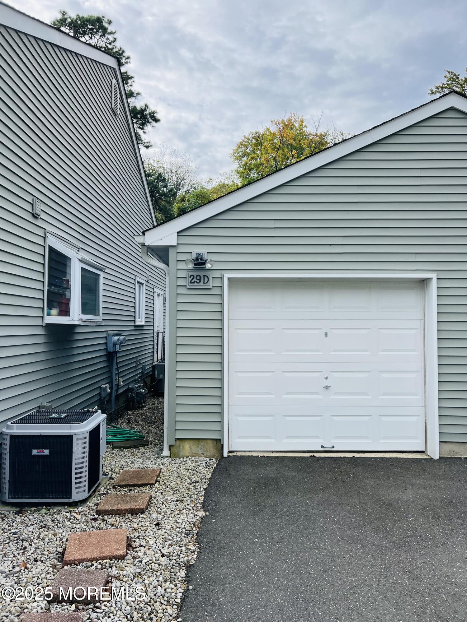 29 Mulberry Court, Unit D Brielle, NJ 08730 - Photo 17 of 22 a front view of a house