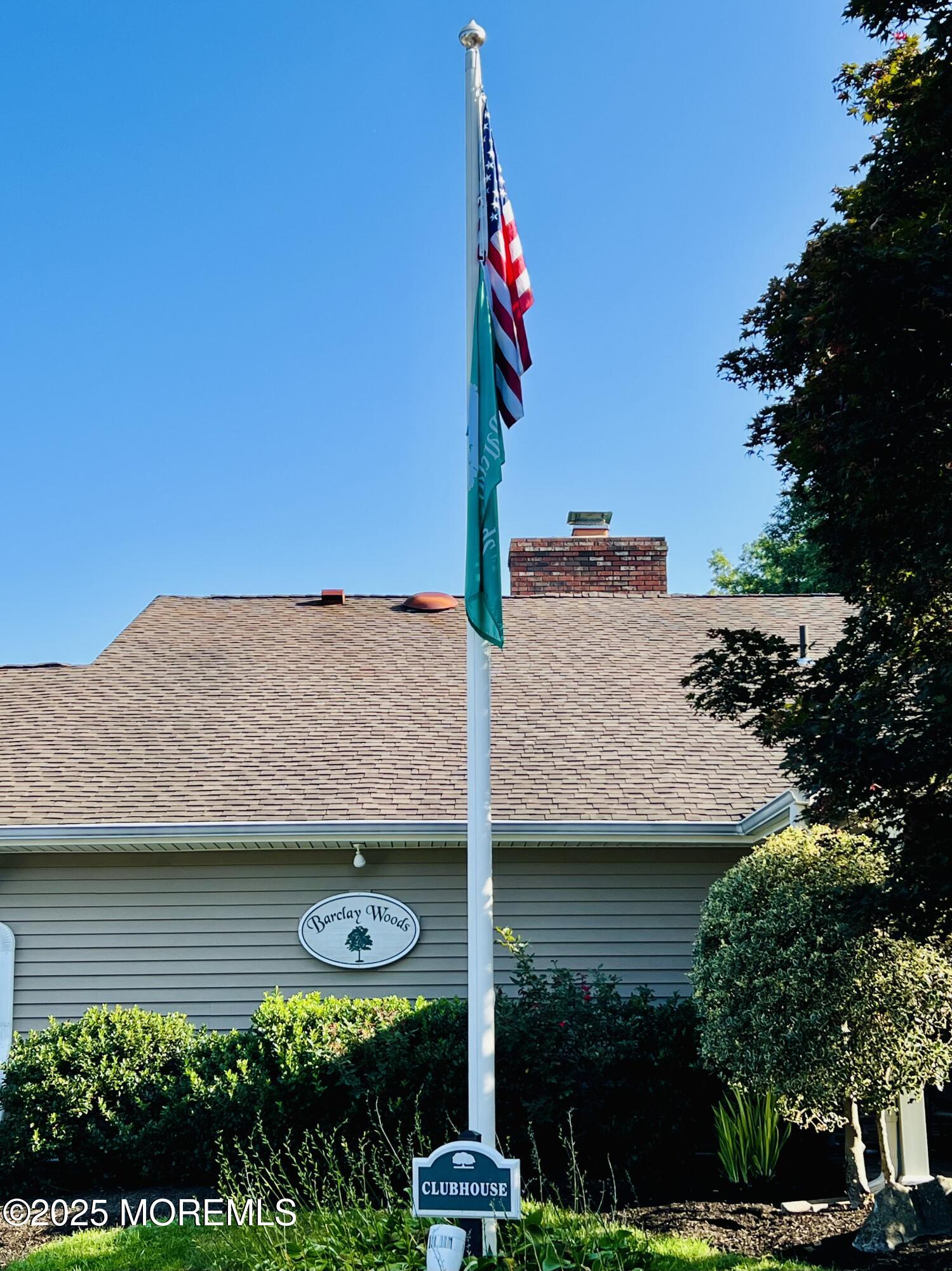 29 Mulberry Court, Unit D Brielle, NJ 08730 - Photo 19 of 22 a front view of a house with garden