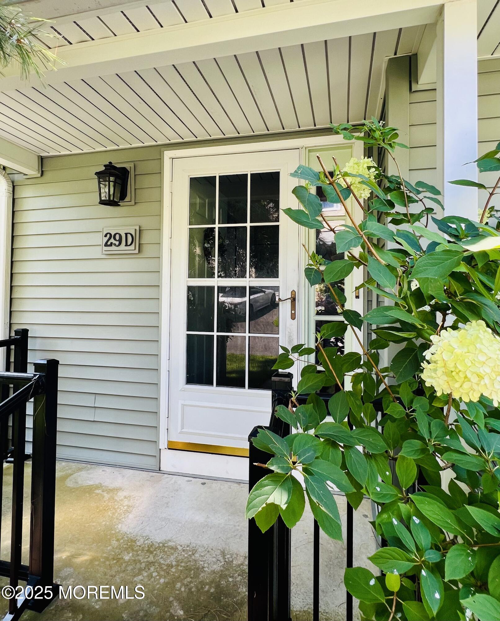 29 Mulberry Court, Unit D Brielle, NJ 08730 - Photo 4 of 22 a view of a house with a window