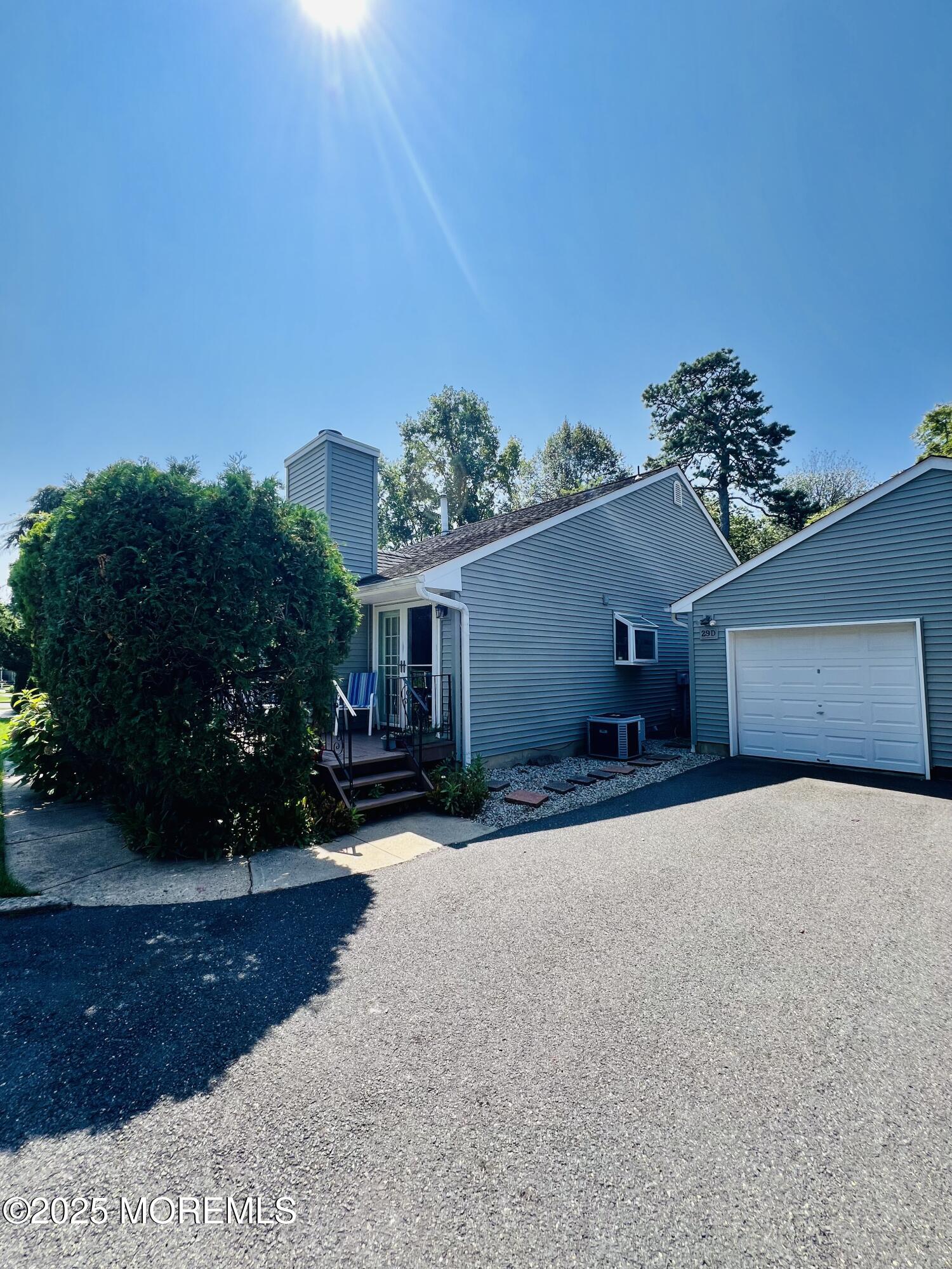 29 Mulberry Court, Unit D Brielle, NJ 08730 - Photo 6 of 22 a house view with a outdoor space