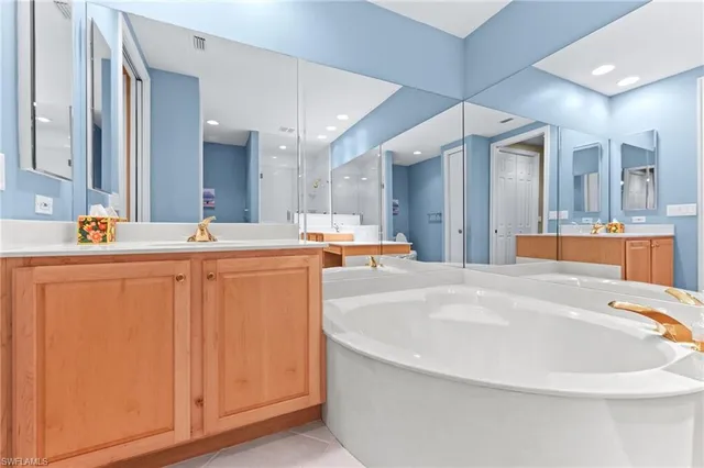 $695,000 | 6057 Ashford Lane, Unit 402, Naples, FL 34110