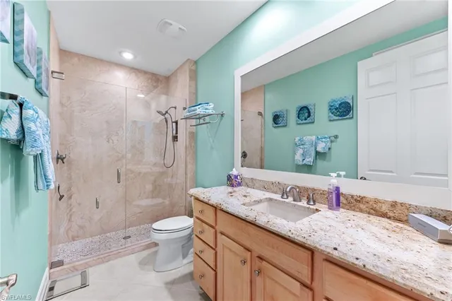 $695,000 | 6057 Ashford Lane, Unit 402, Naples, FL 34110