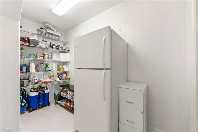 $695,000 | 6057 Ashford Lane, Unit 402, Naples, FL 34110