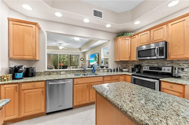 $695,000 | 6057 Ashford Lane, Unit 402, Naples, FL 34110