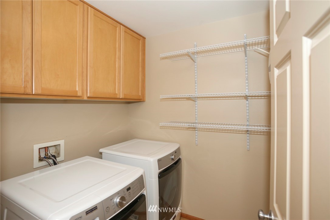 813 Field Avenue Northeast Renton, WA 98059 - Photo 20 of 22 a utility room with dryer and washer