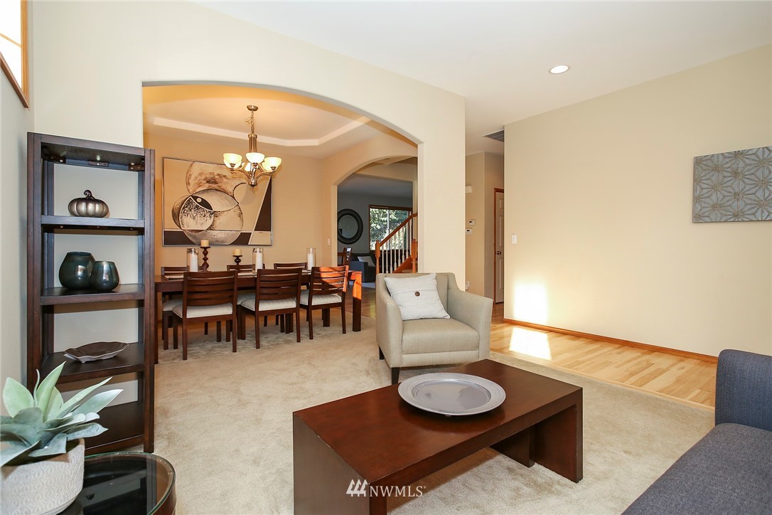 813 Field Avenue Northeast Renton, WA 98059 - Photo 3 of 22 a living room with furniture and wooden floor