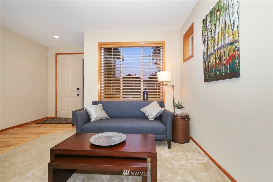 813 Field Avenue Northeast Renton, WA 98059 - Photo 4 of 22 a living room with furniture and a window