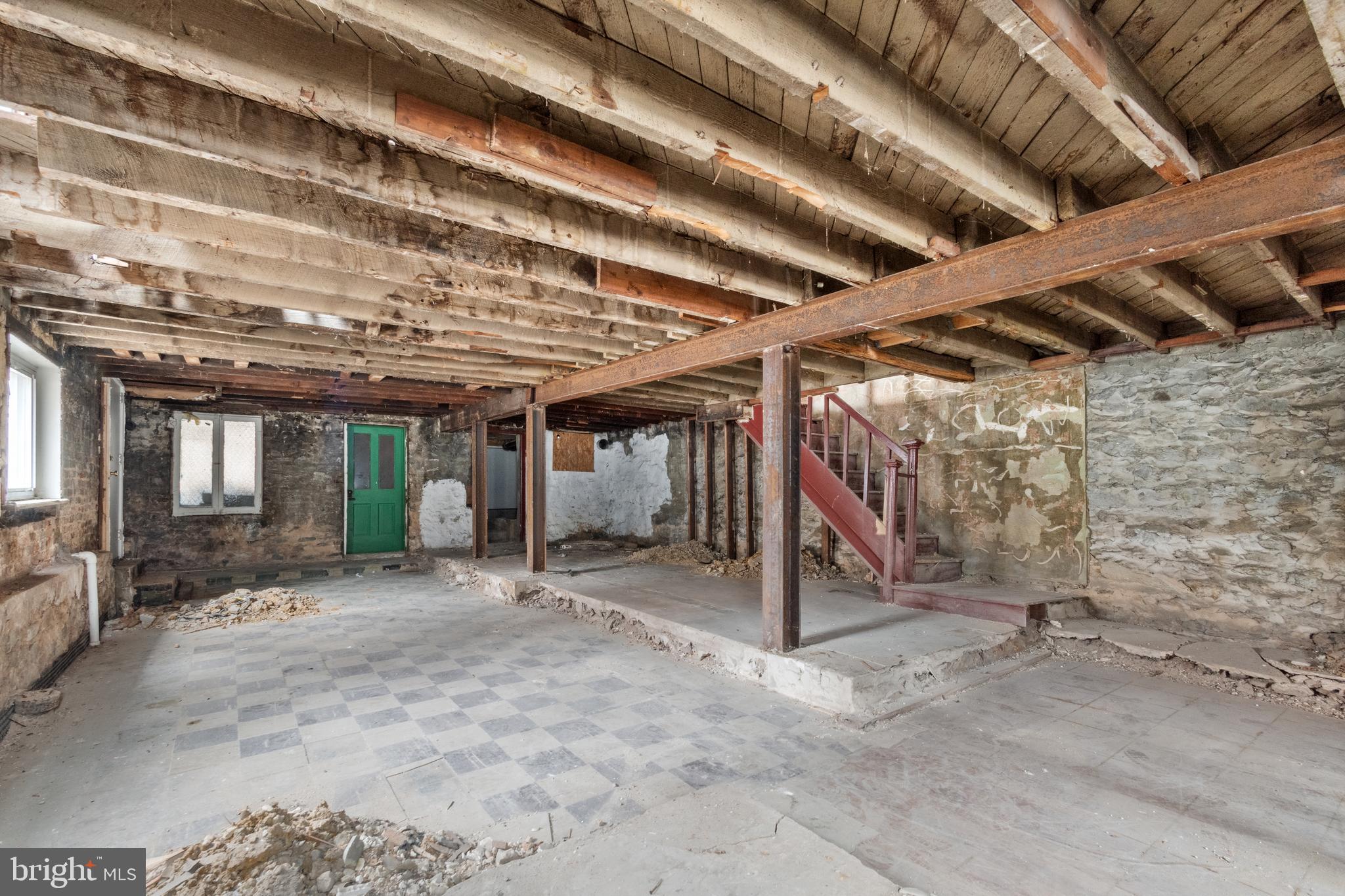 109 East 33rd Street Baltimore, MD 21218 - Photo 24 of 26 a view of a room with wooden walls