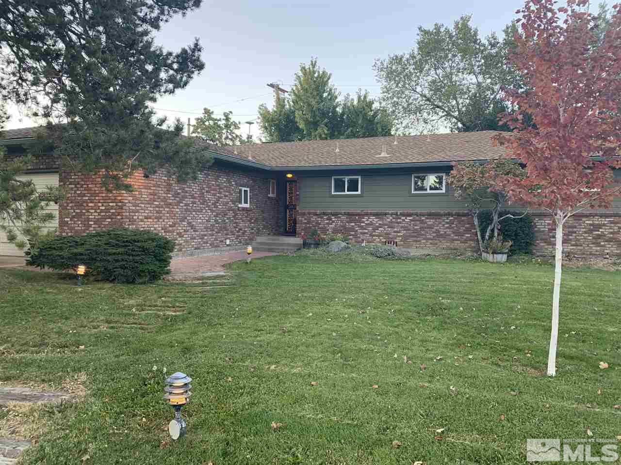 1795 Wren Street Reno, NV 89509 - Photo 1 of 27 a view of a house with a yard