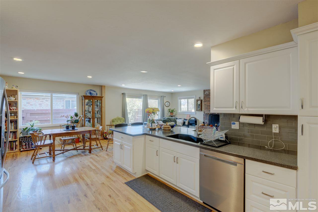 1795 Wren Street Reno, NV 89509 - Photo 8 of 27 a kitchen with lots of counter top space and dining table