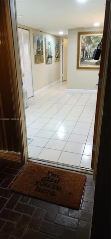 a view of wooden floor in a living room