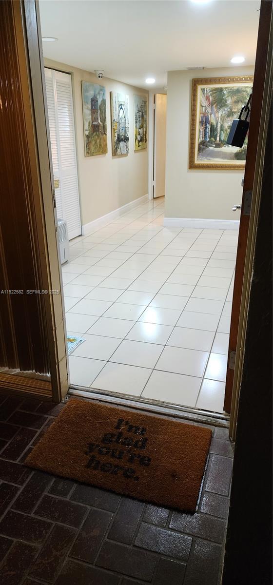 6701 Southwest 116th Court, Unit 203 Miami, FL 33173 - Photo 7 of 12 a view of wooden floor in a living room