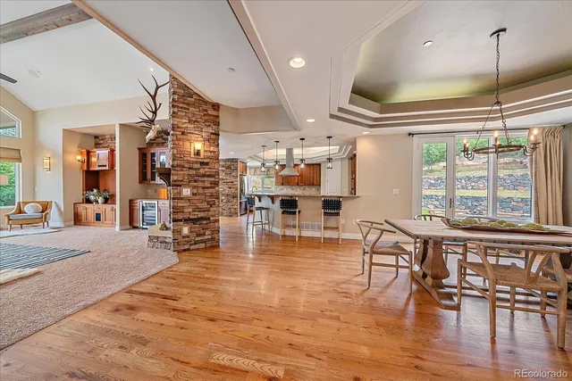 a view of a living room and dining room