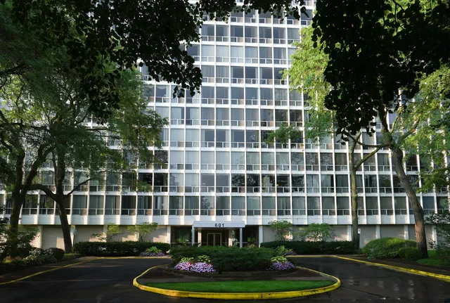 a front view of a building with street view