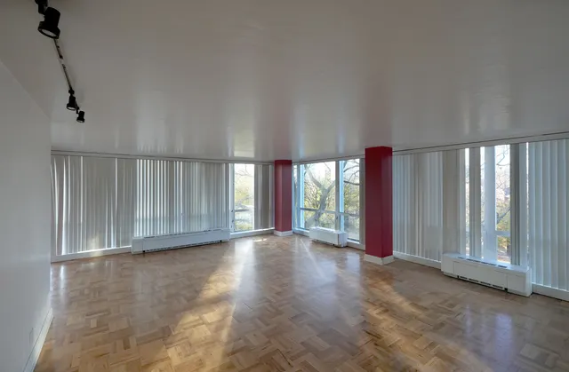 a view of hallway with natural light