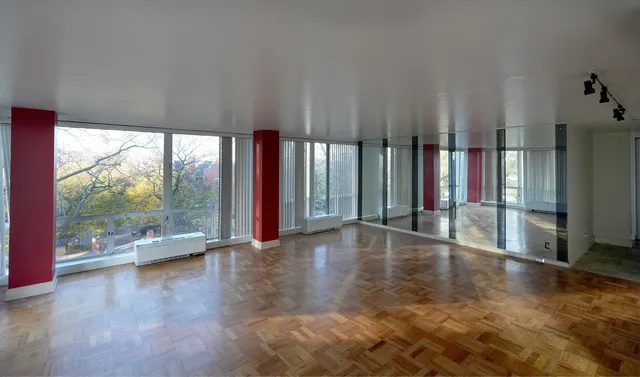 a view of a kitchen with dishwasher and refrigerator