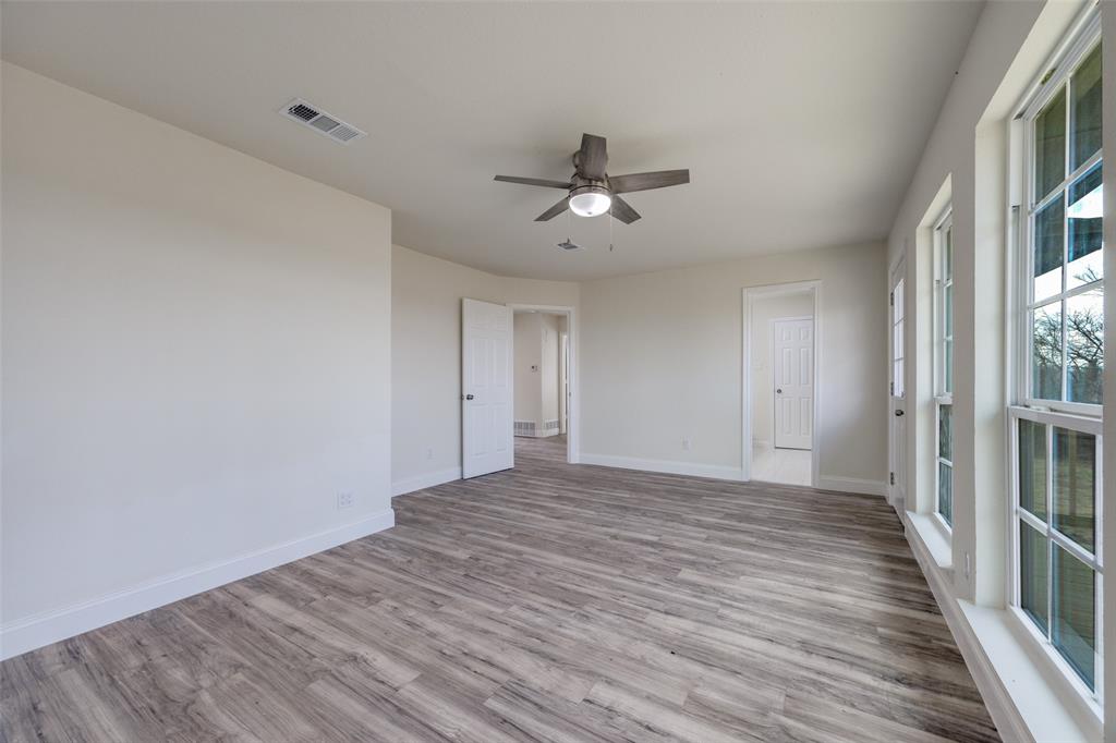 471 Meadowview Circle Van Alstyne, TX 75495 - Photo 16 of 39 a view of empty room with wooden floor