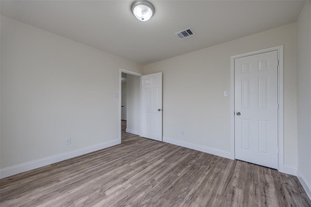 471 Meadowview Circle Van Alstyne, TX 75495 - Photo 25 of 39 a view of an empty room with wooden floor