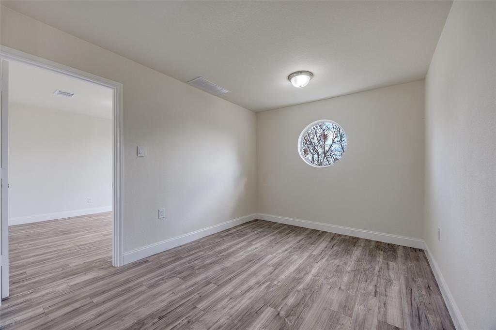 471 Meadowview Circle Van Alstyne, TX 75495 - Photo 28 of 39 a view of empty room with wooden floor