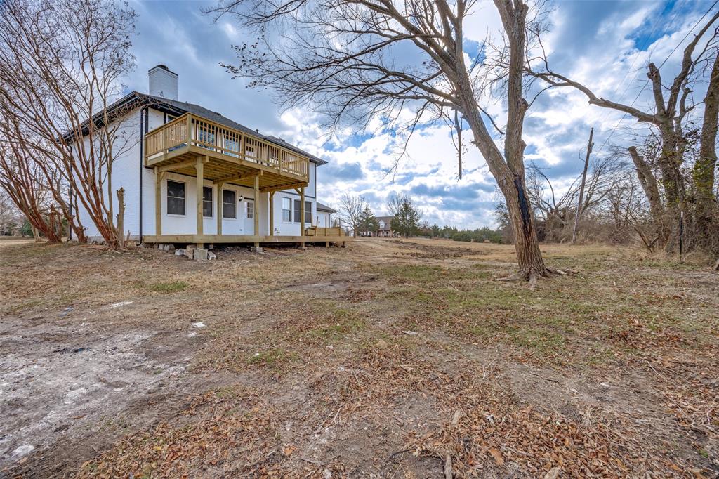 471 Meadowview Circle Van Alstyne, TX 75495 - Photo 32 of 39 a view of a house with a yard