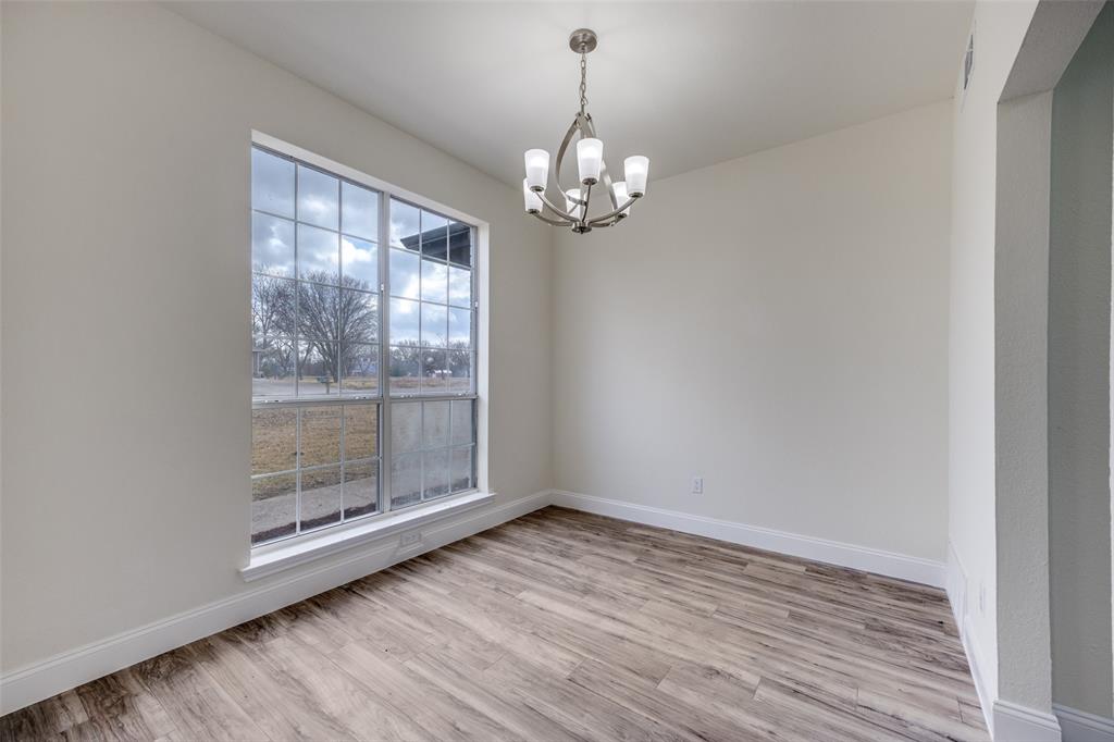 471 Meadowview Circle Van Alstyne, TX 75495 - Photo 4 of 39 a view of an empty room with a window