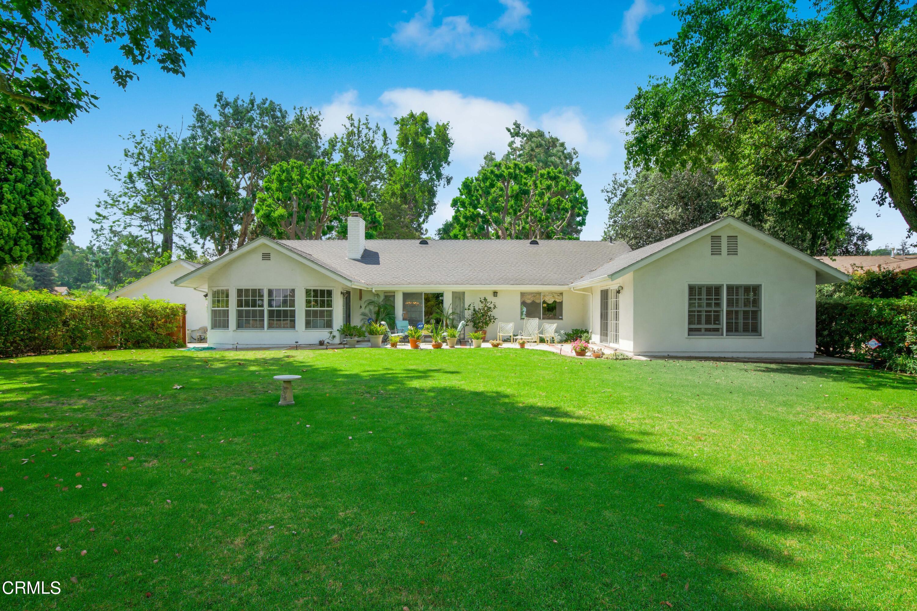 1387 Fairway Drive Camarillo, CA 93010 - Photo 2 of 51 a front view of a house with a yard
