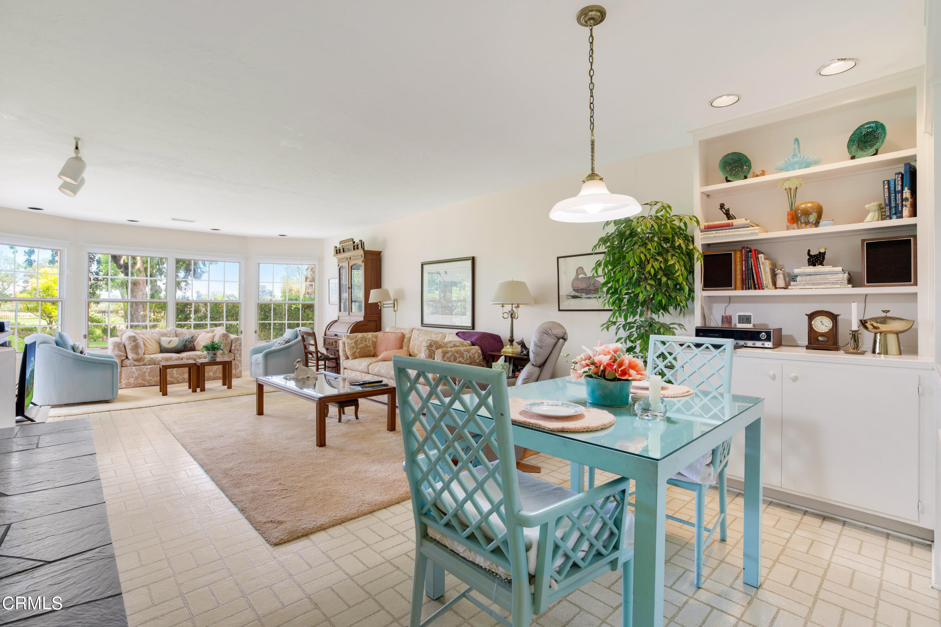 1387 Fairway Drive Camarillo, CA 93010 - Photo 12 of 51 a living room with furniture a rug and a chandelier