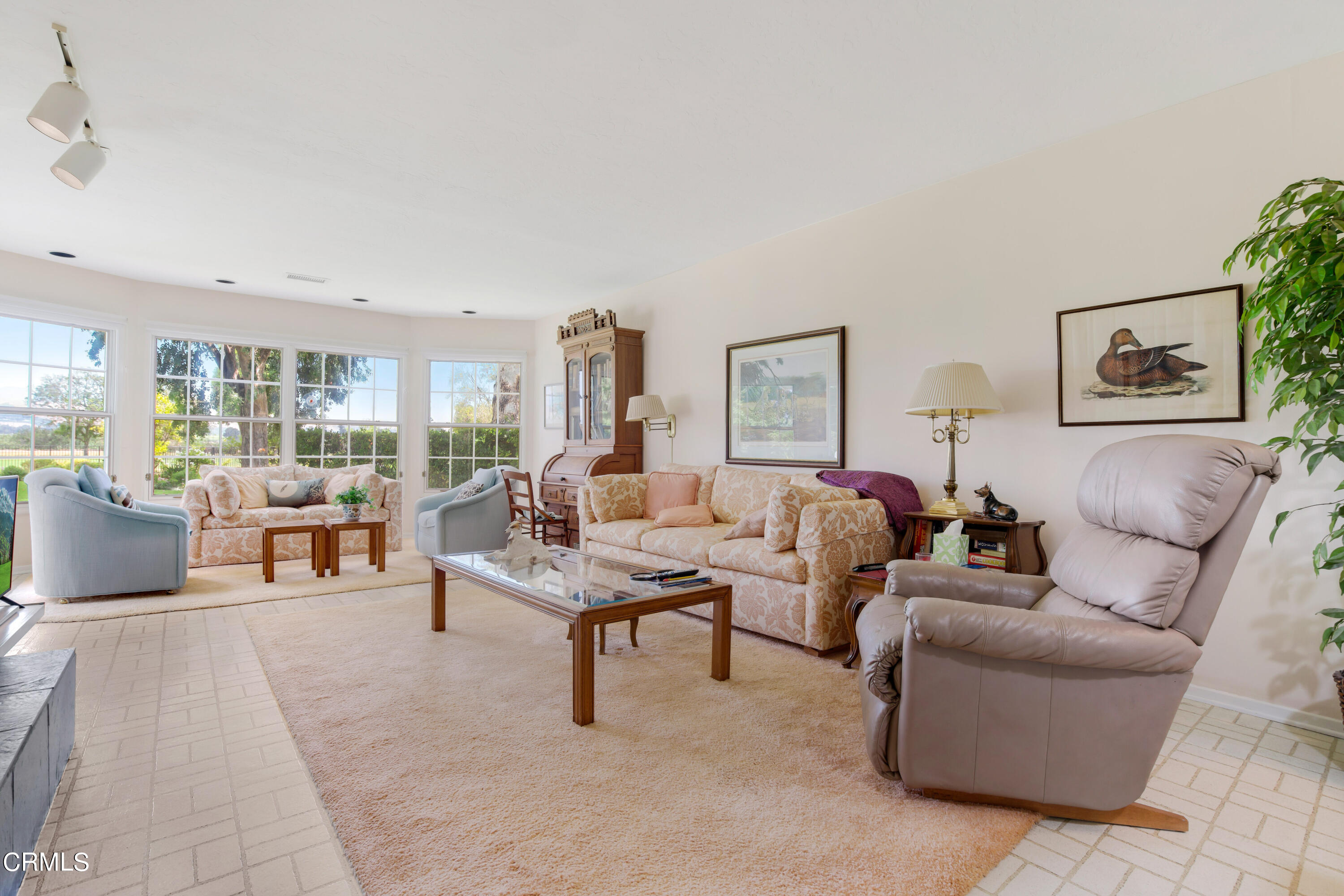 1387 Fairway Drive Camarillo, CA 93010 - Photo 13 of 51 a living room with furniture and a table
