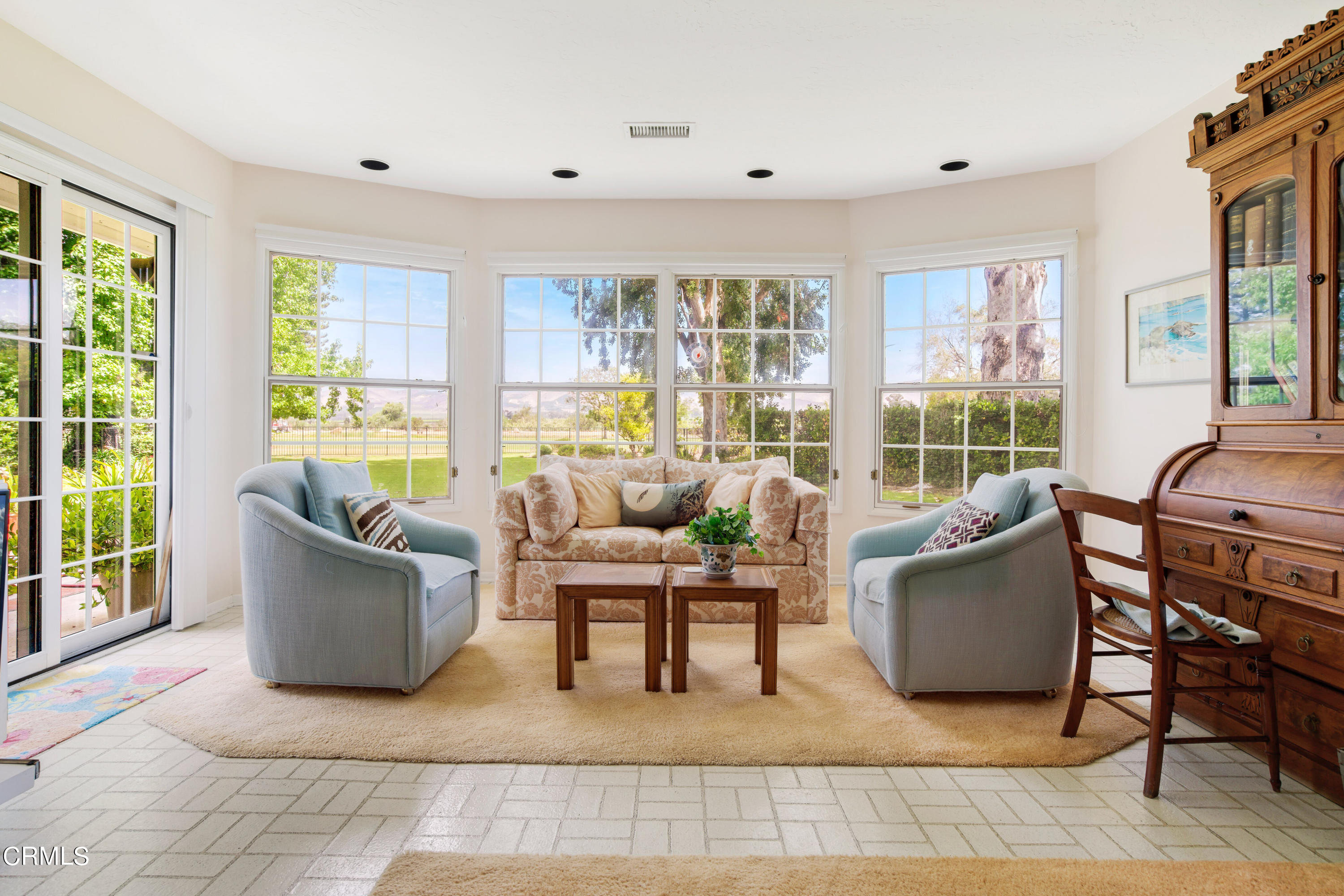 1387 Fairway Drive Camarillo, CA 93010 - Photo 15 of 51 a living room with furniture and a floor to ceiling window