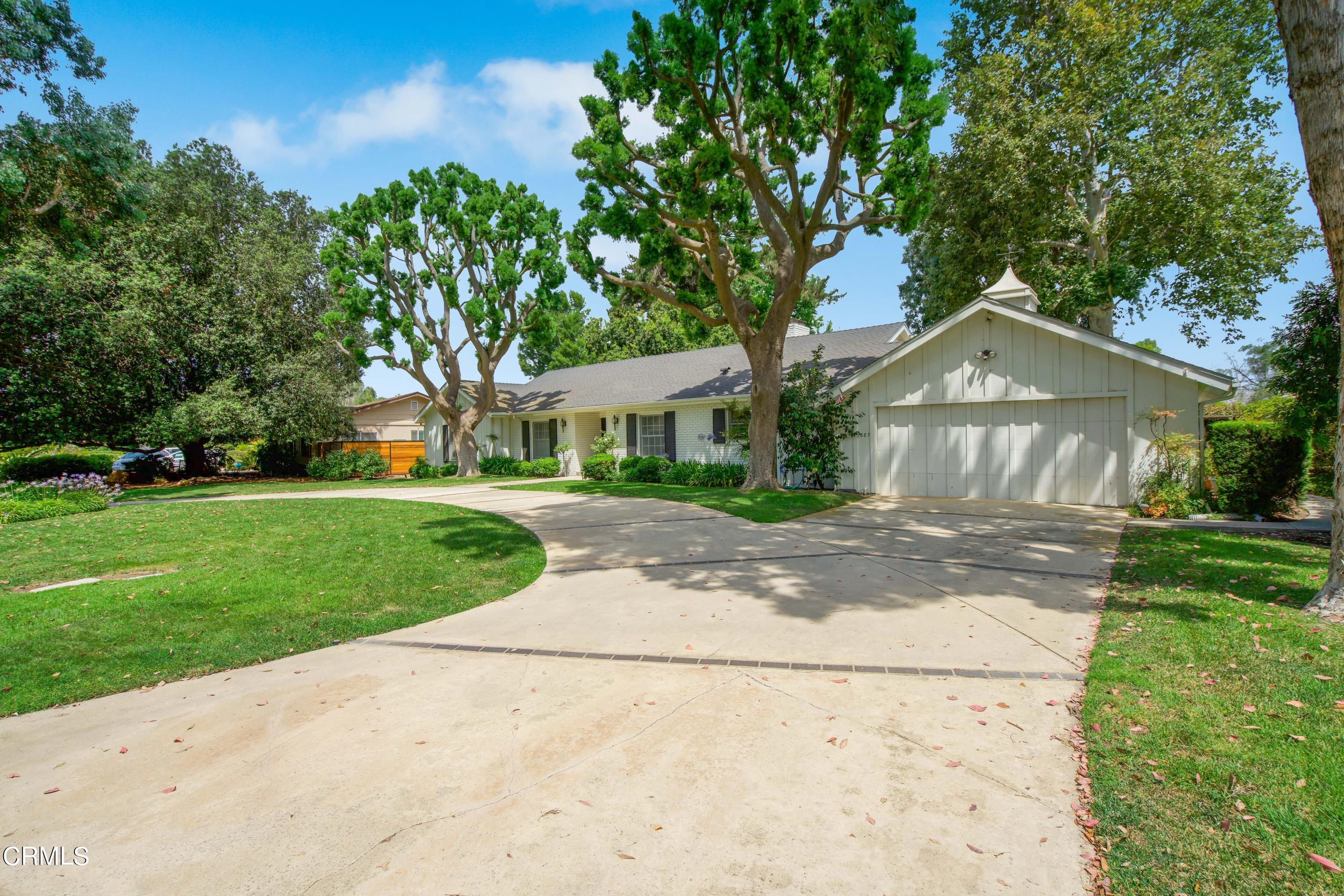 1387 Fairway Drive Camarillo, CA 93010 - Photo 5 of 51 a front view of a house with a yard