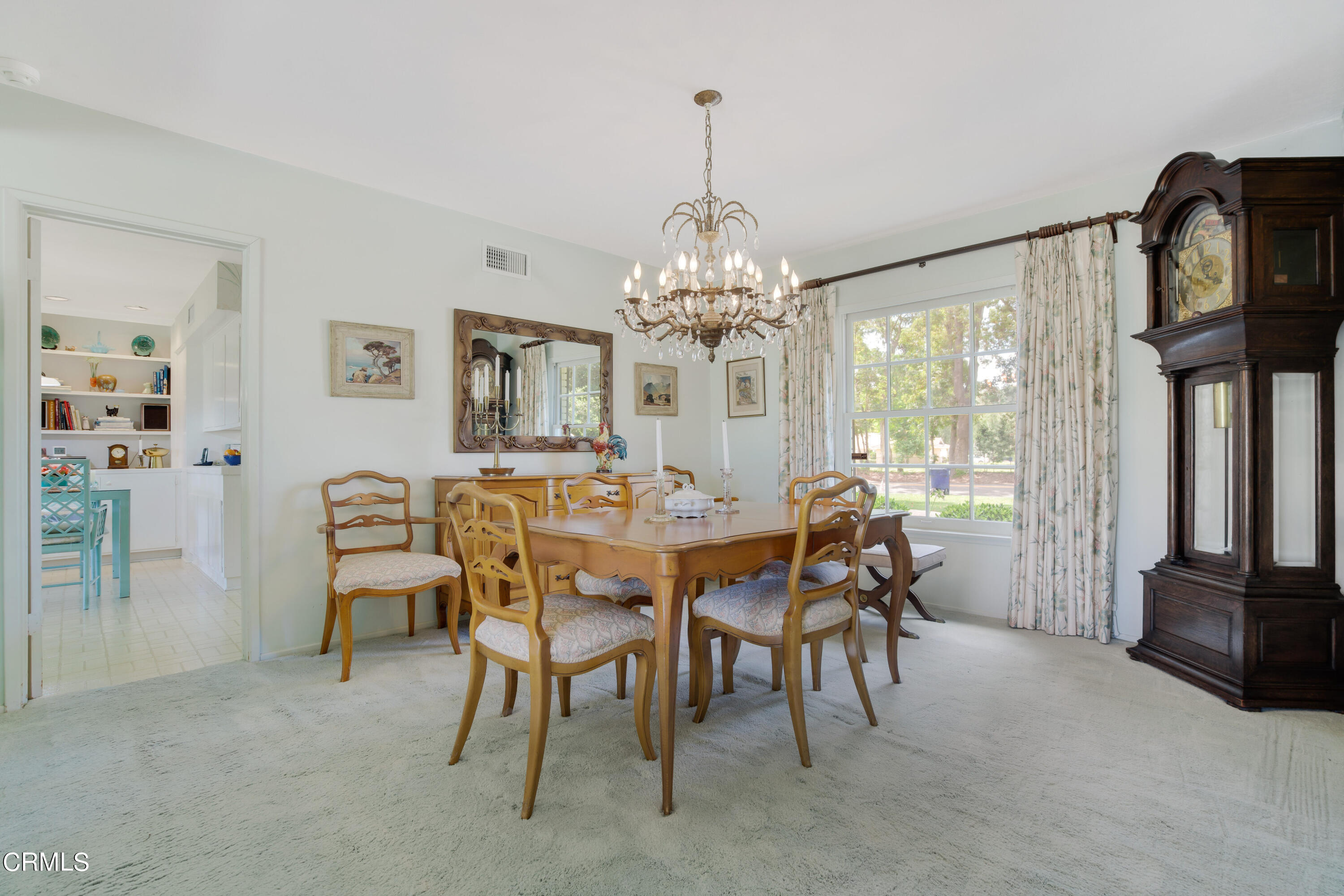 1387 Fairway Drive Camarillo, CA 93010 - Photo 10 of 51 a dining room with furniture a chandelier and a rug