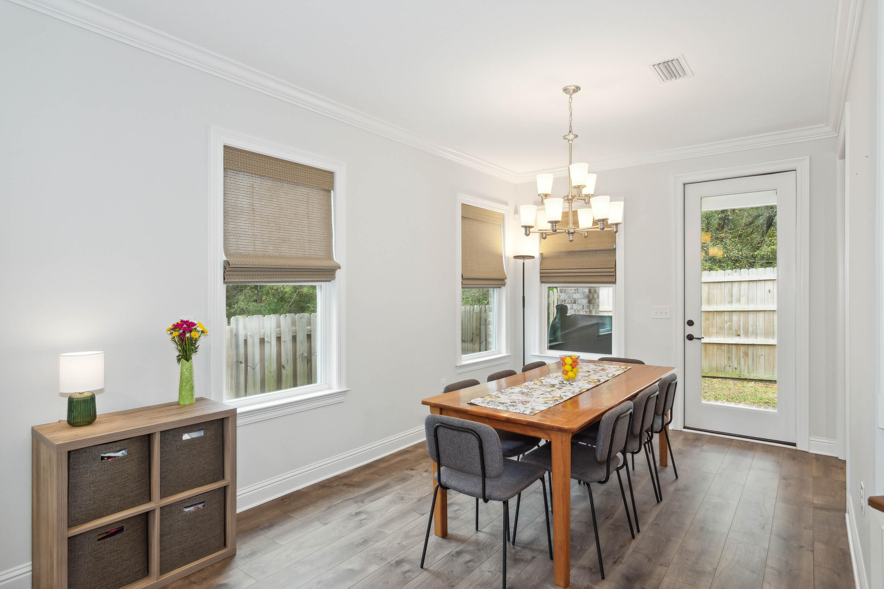 159 Laurel Oaks Drive Freeport, FL 32439 - Photo 12 of 34 a view of a dining room with furniture and window