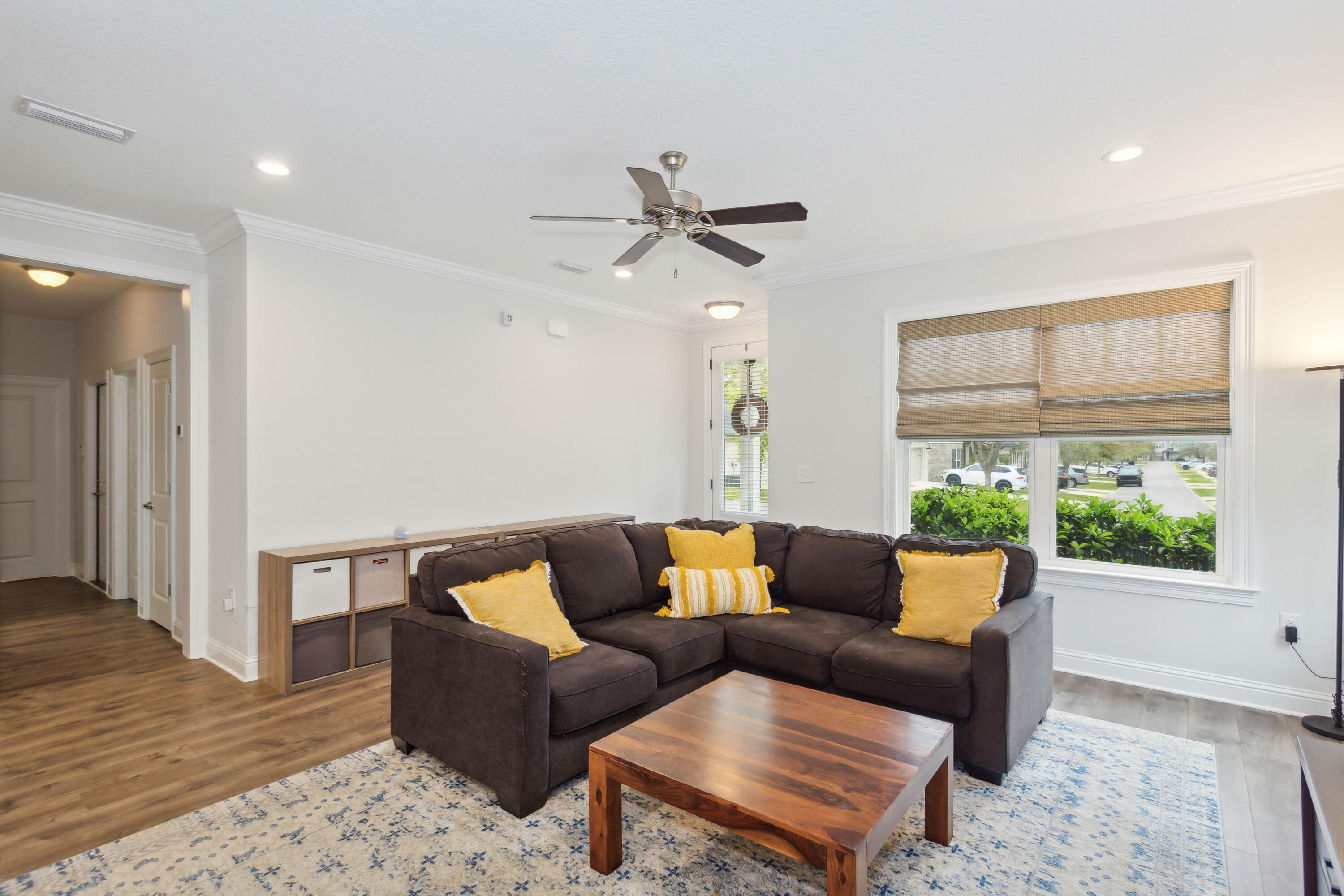 159 Laurel Oaks Drive Freeport, FL 32439 - Photo 14 of 34 a living room with furniture and wooden floor