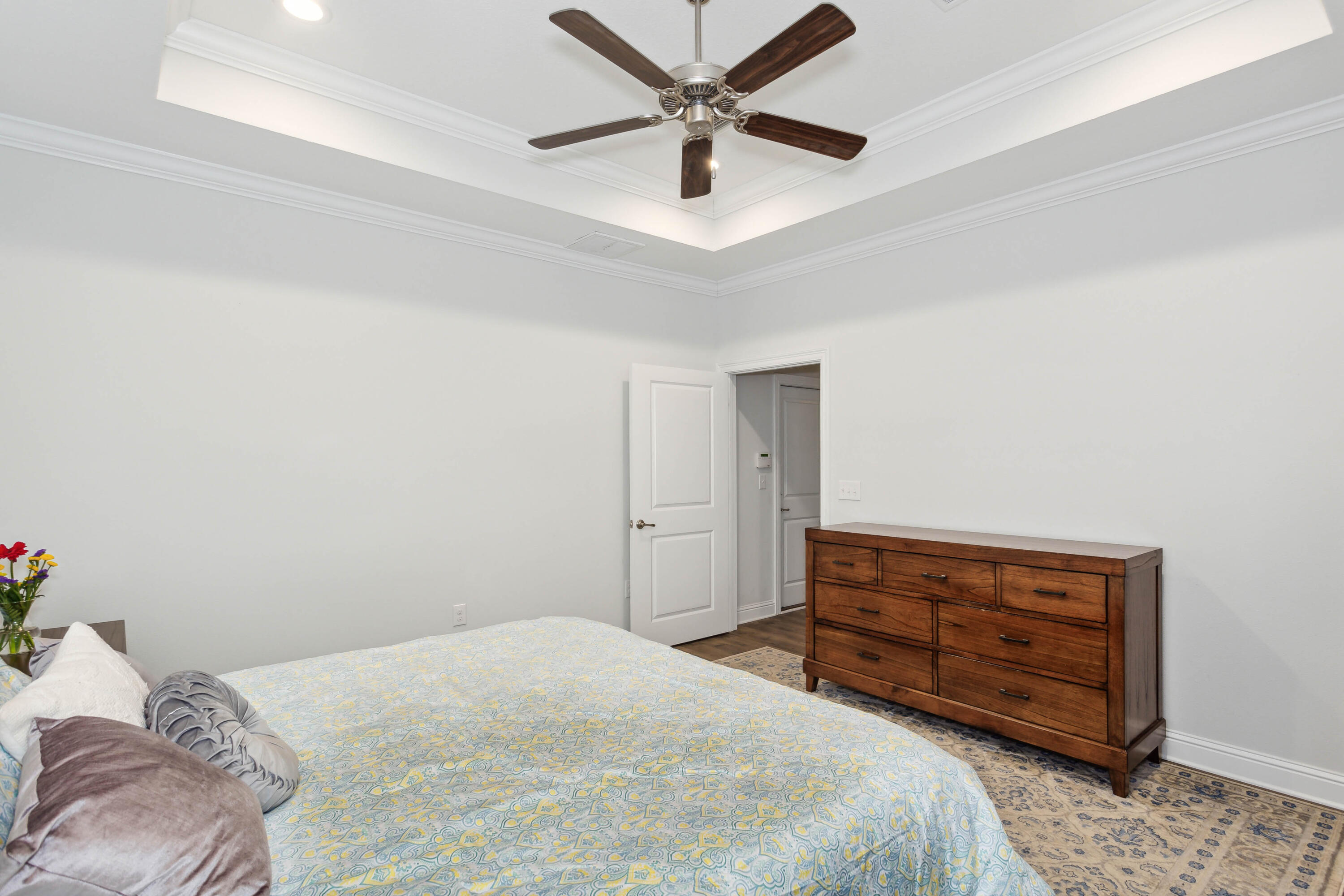159 Laurel Oaks Drive Freeport, FL 32439 - Photo 20 of 34 a bedroom with a bed and a dresser