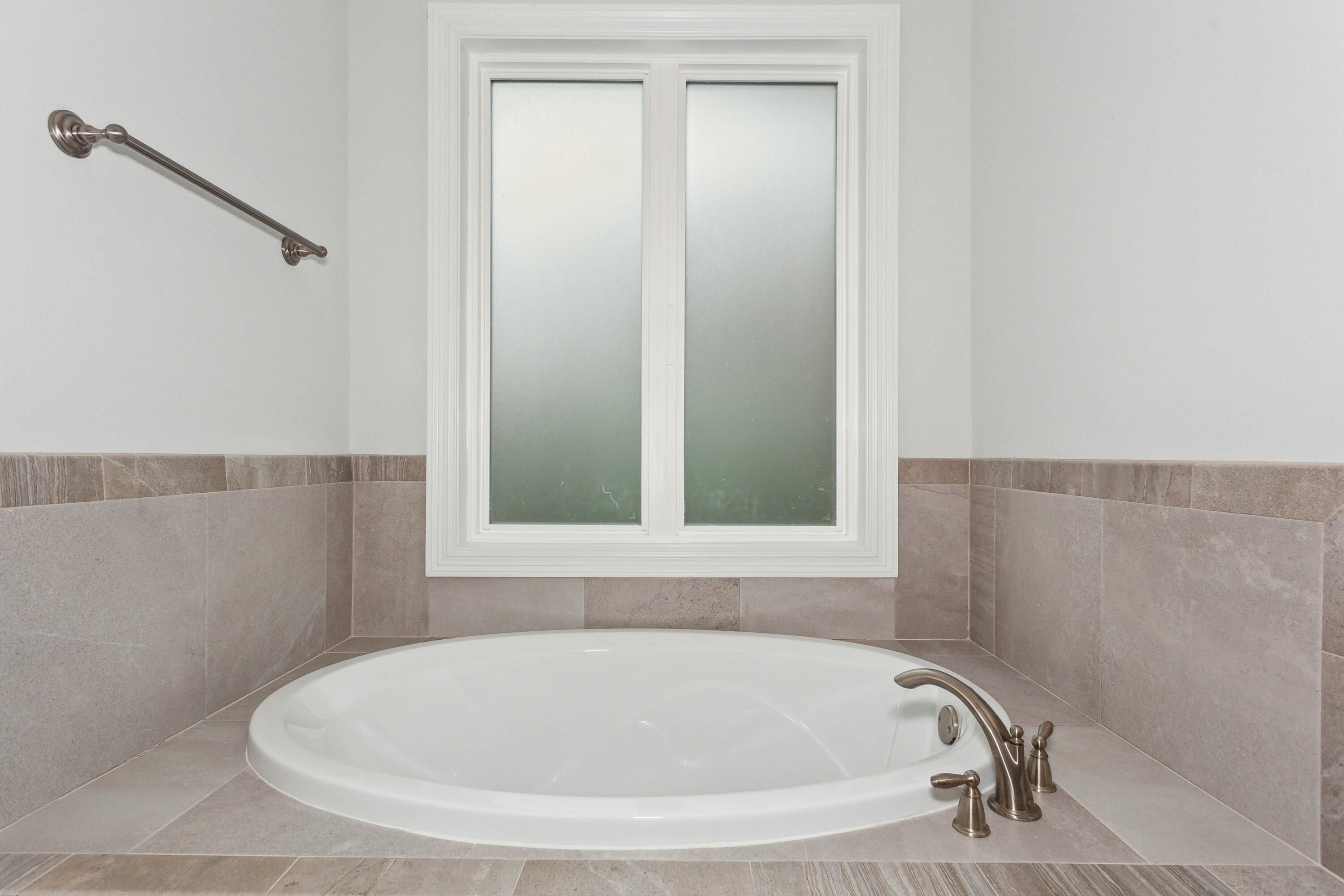 159 Laurel Oaks Drive Freeport, FL 32439 - Photo 23 of 34 a white bath tub sitting in a bathroom