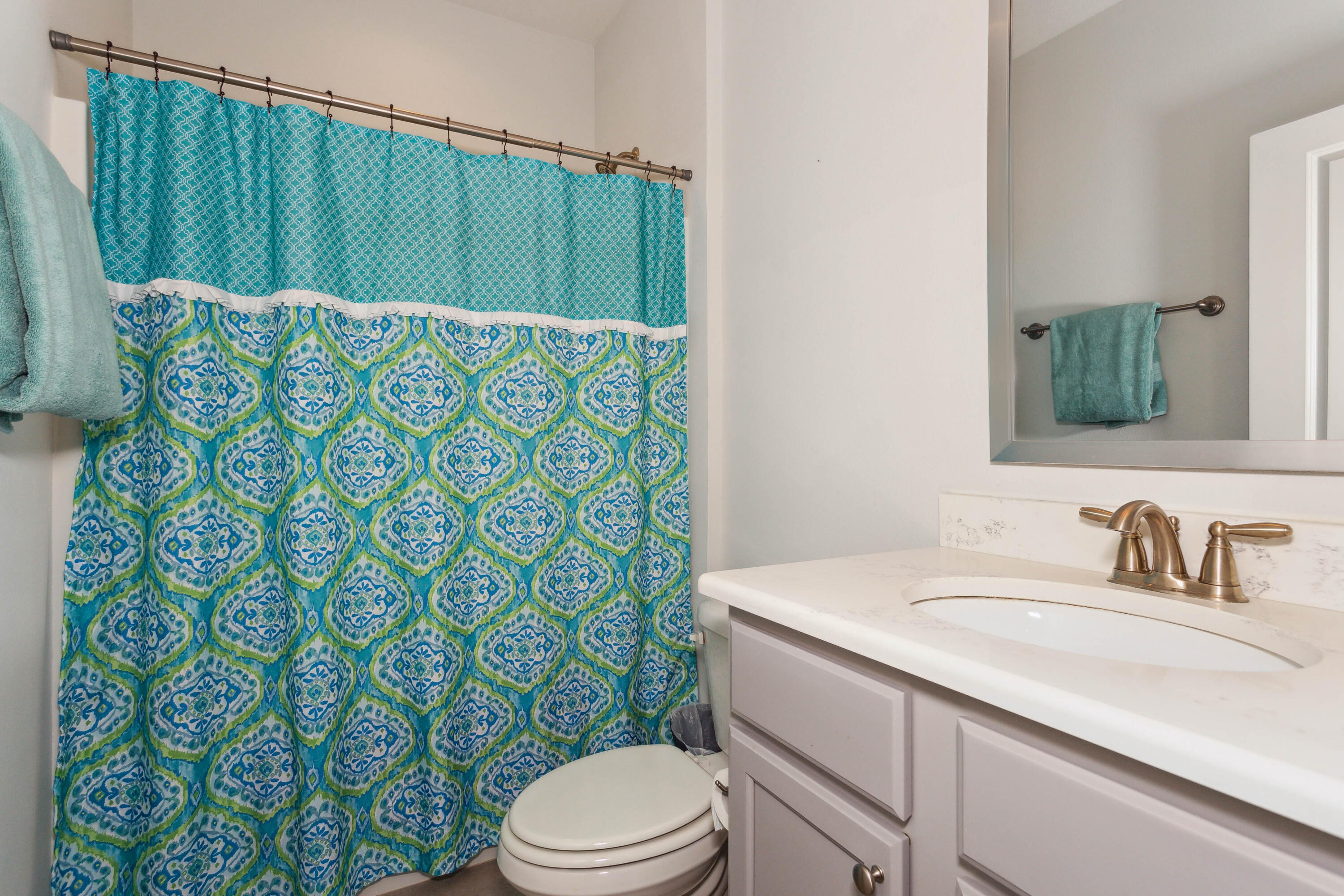 159 Laurel Oaks Drive Freeport, FL 32439 - Photo 25 of 34 a bathroom with a sink toilet and shower