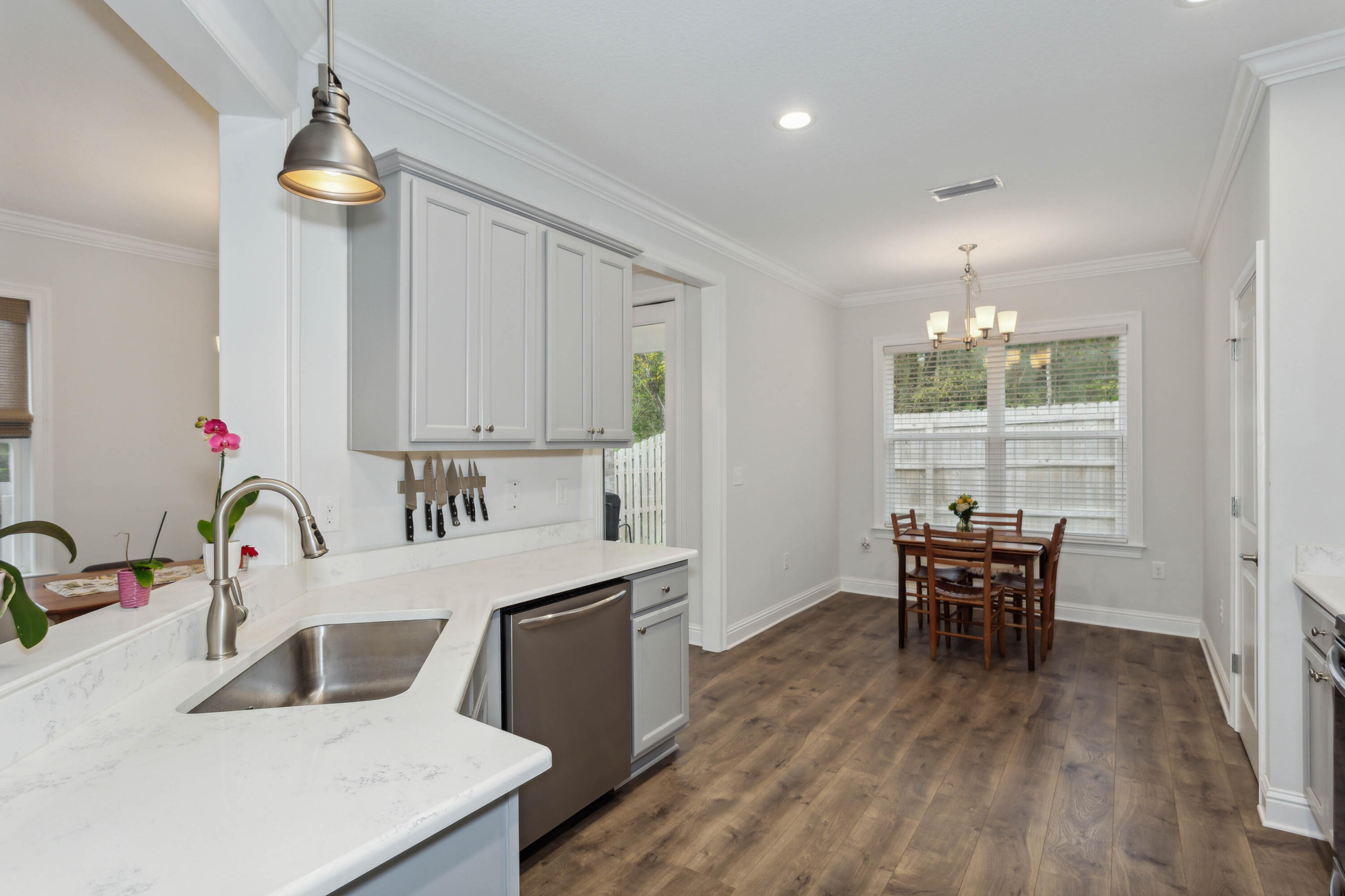 159 Laurel Oaks Drive Freeport, FL 32439 - Photo 7 of 34 a kitchen with a table and chairs in it