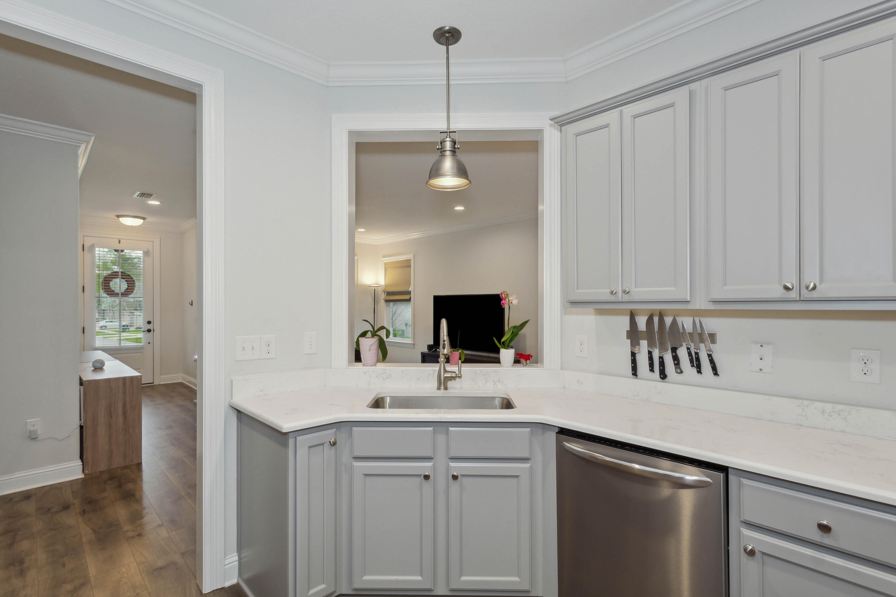 159 Laurel Oaks Drive Freeport, FL 32439 - Photo 8 of 34 a kitchen with a sink and cabinets